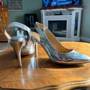Silver, 3” heels in silver, sling back. Shoedazzle heels.